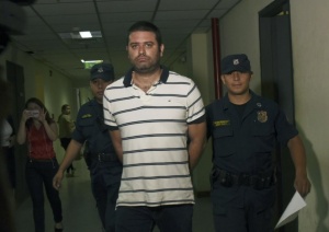 Gregorio “Papo Morales”, custodiado por efectivos policiales. 